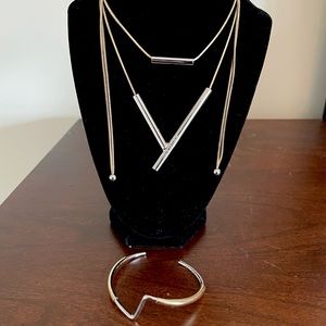 Adolfo Dominguez double layer adjustable necklace and matching bracelet.